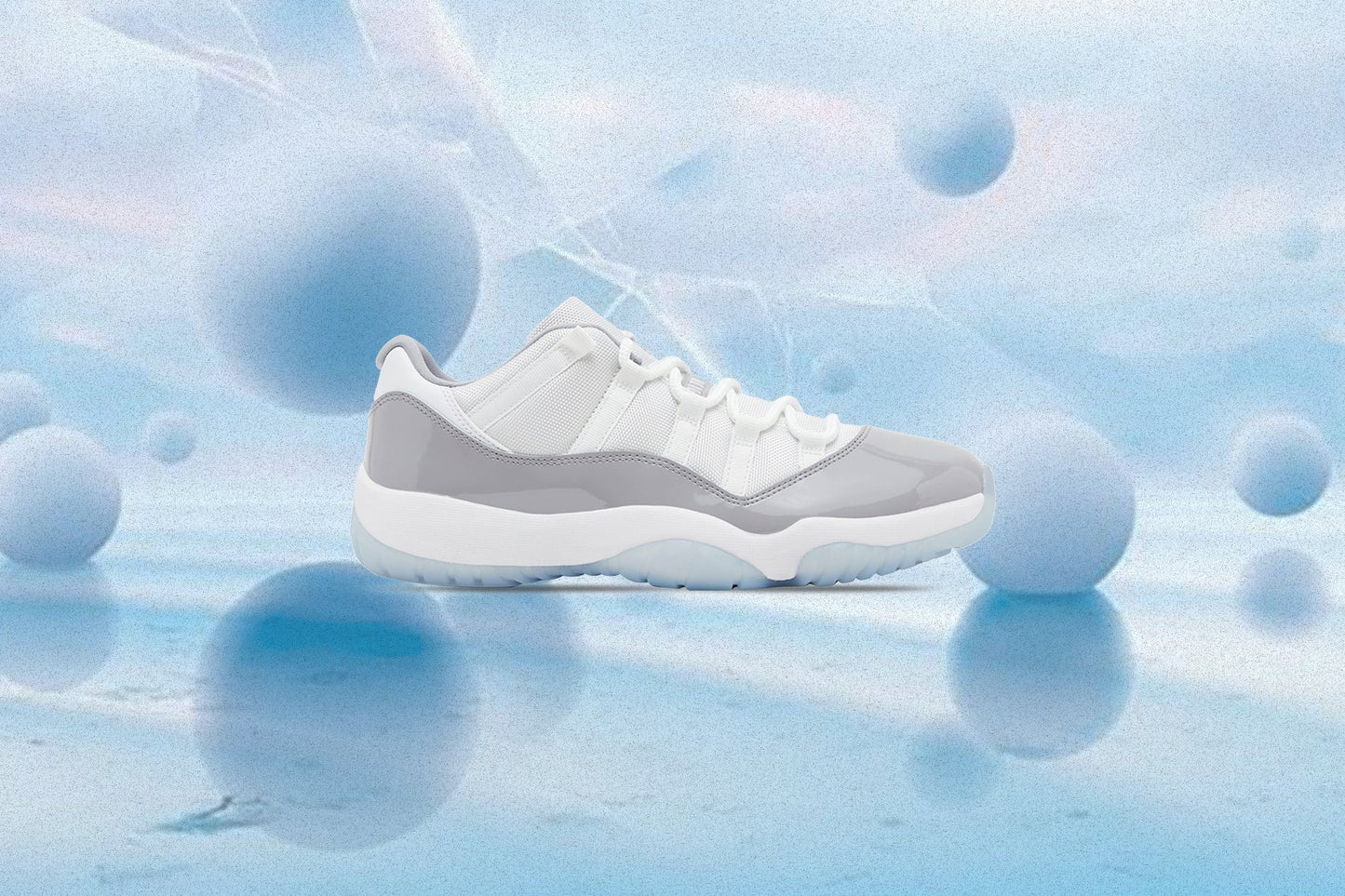 Air Jordan 11 Retro Low Cement Grey - White/University Blue/Cement Grey