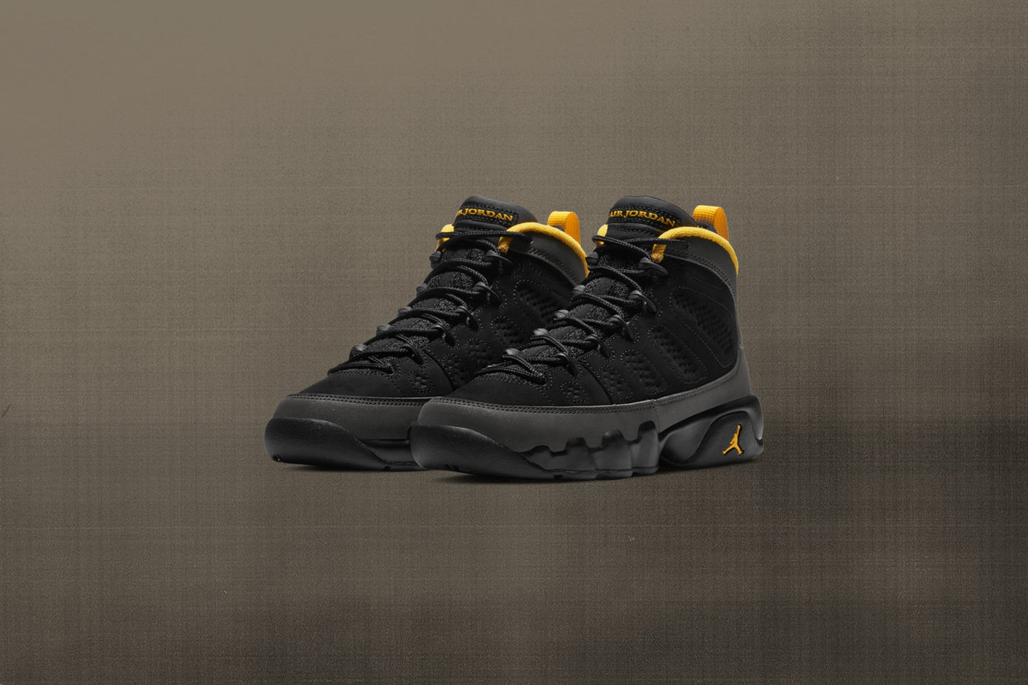 Air Jordan 9 Retro (GS) "University Gold" - Black/Dark Charcoal