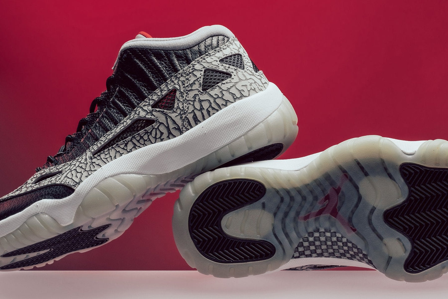 Air Jordan 11 Retro Low IE "Black Cement" - Black/Fire Red