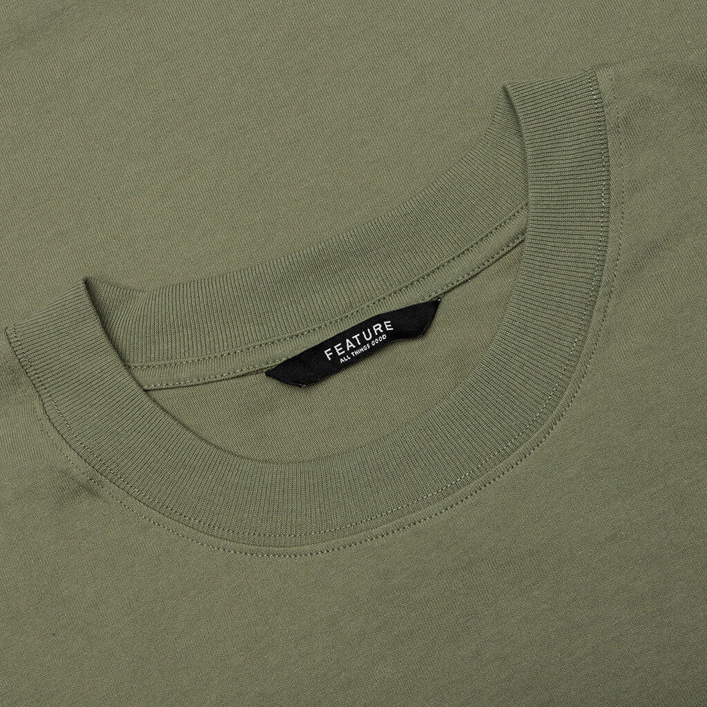 Feature x MAD Gallery x Pretty Done Direction Tee - Oil Green